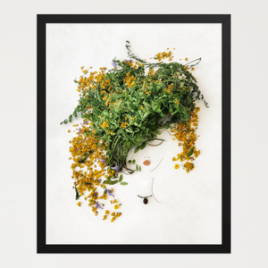 Feminine profile emerging from flowing greenery and scattered yellow blossoms with leaf-shaped hair. Botanical wall art by FloraFusion.