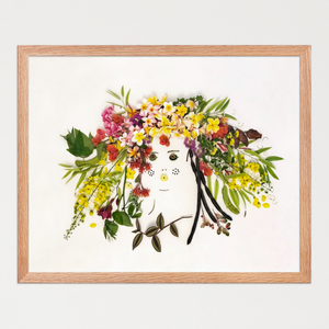 Feminine face with a floral crown of yellow, pink, green, and muted red blossoms and leaves. Botanical wall art by FloraFusion.