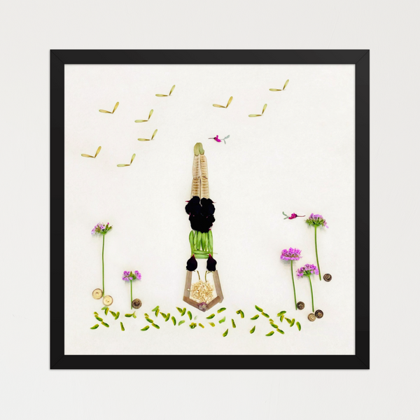 Stylized feminine figure built from soft pink blossoms and muted green stems on a white background. Botanical wall art by FloraFusion.