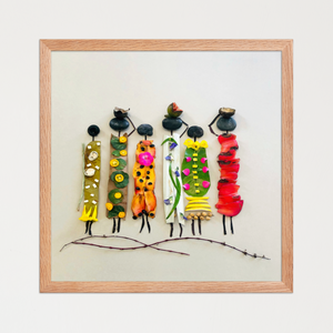 Row of feminine figures with stone heads and varied dresses of leaves, petals, fruit skins, and seeds. Botanical wall art by FloraFusion.