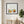 Meadow Garden botanical wall art print in a black frame, shown in a calm neutral room