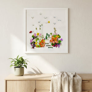 Meadow Garden botanical wall art print in a white frame, shown in a calm neutral room