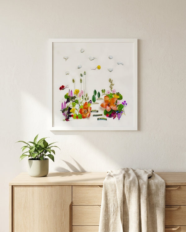 Meadow Garden botanical wall art print in a white frame, shown in a calm neutral room