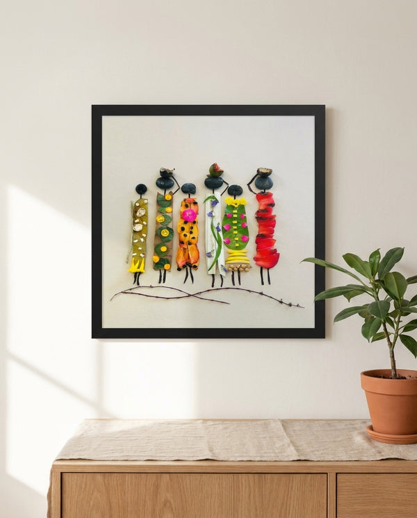 Garden Sisters botanical wall art print in a black frame, shown in a calm neutral room