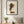 Autumn Stillness print in a black frame styled in a living room. FloraFusion.