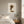 Autumn Stillness print in a white frame hung in a serene bedroom. FloraFusion.