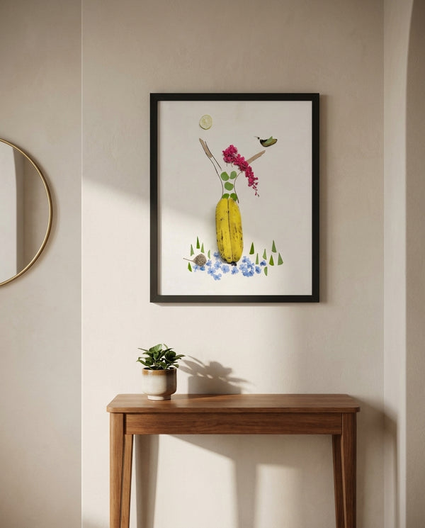 Banana Bloom print in a black frame styled in an entryway. FloraFusion.