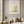 Beneath the Growing Tree print in a white frame styled in a living room. FloraFusion.