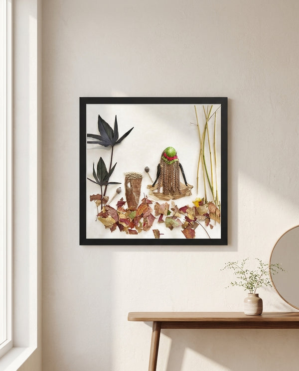 Braided by Nature in a black frame styled in an entryway. FloraFusion botanical wall art.