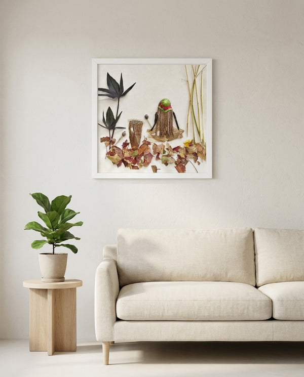 Braided by Nature in a white frame hanging in a serene living room. FloraFusion botanical wall art.