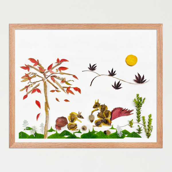 Two squirrels beneath a slender tree with warm red leaves, scattered grasses, and a small sun on white. Botanical wall art by FloraFusion.