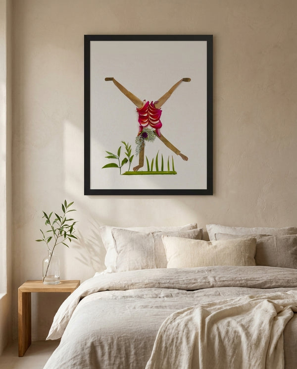 Cartwheel Spin botanical cartwheel wall art print in a black frame hanging in a bedroom