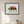 Chameleon in Bloom art in a black frame hanging in a kids room
