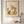 Curious Little Elephant botanical wildlife wall art print in a red oak wood frame hanging in a bathroom
