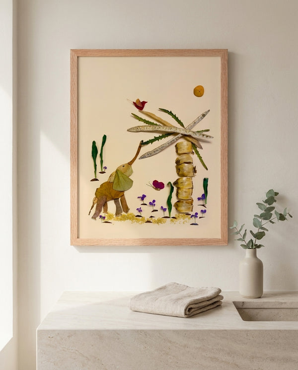 Curious Little Elephant botanical wildlife wall art print in a red oak wood frame hanging in a bathroom