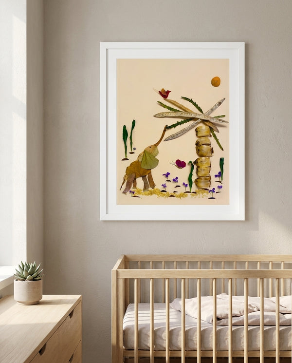 Curious Little Elephant botanical wildlife wall art print in a white frame hanging in a nursery
