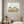 Cypress Afternoon nature-inspired park scene wall art print in a white frame hanging in a living room