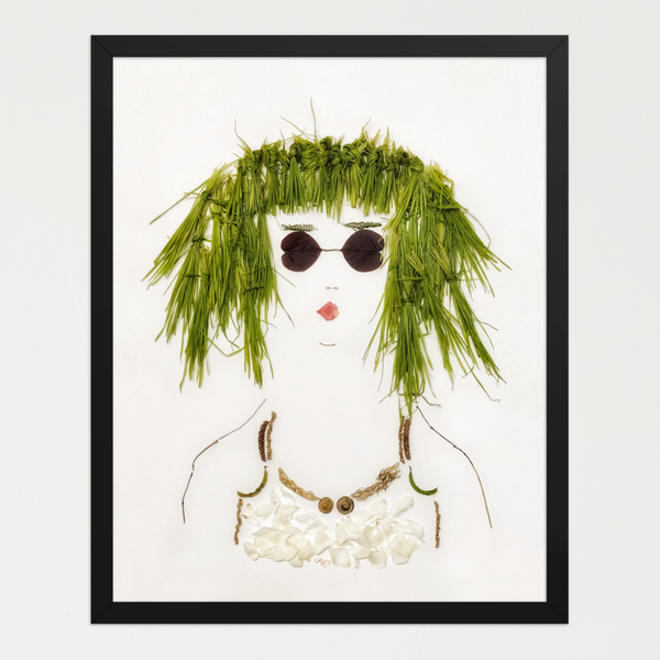Feminine portrait with green grass hair, dark leaf eyes, and small petal and seed pod details on white. Botanical wall art by FloraFusion.