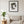 Fern Lady art print in a black frame in a modern living room