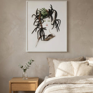 Fern Lady art print in a white frame hanging in a serene bedroom