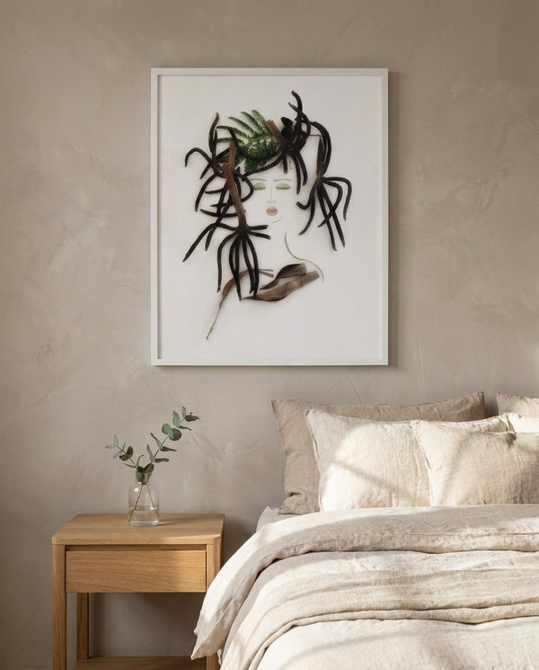 Fern Lady art print in a white frame hanging in a serene bedroom