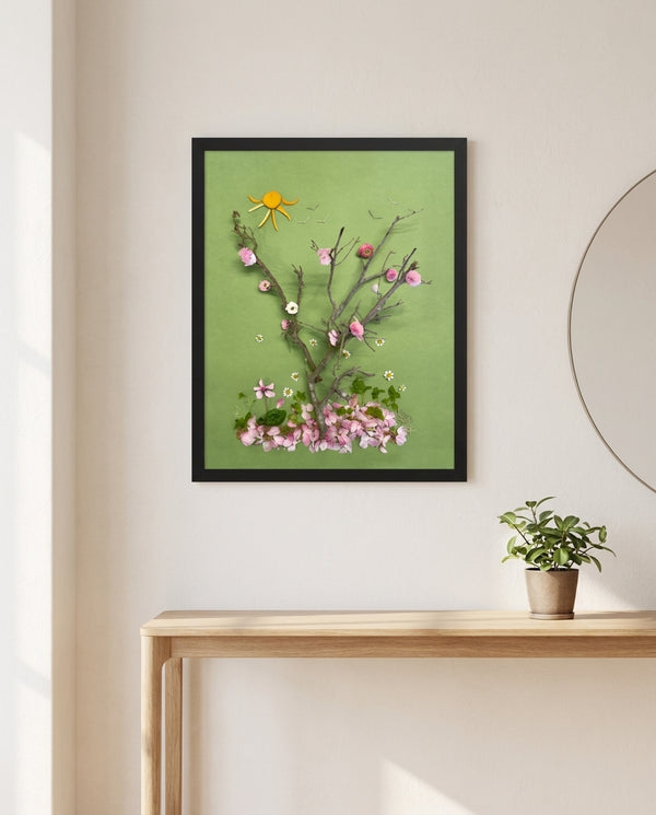 First Blossoms botanical spring tree wall art print in a black frame hanging in an entryway