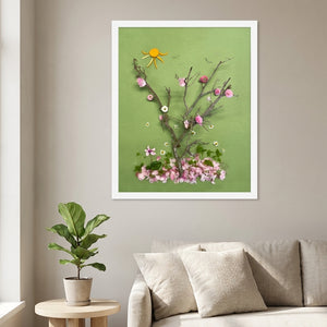 First Blossoms botanical spring tree wall art print in a white frame hanging in a living room