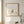Forward in Bloom in a red oak frame in a warm bathroom