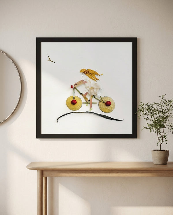 Garden Bicycle art print in a black frame in a warm entryway