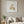 Garden Bicycle art print in a white frame in a modern living room