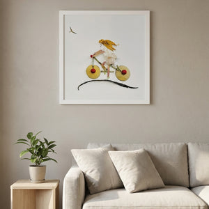 Garden Bicycle art print in a white frame in a modern living room
