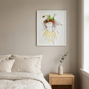 Garden Crown Lady art print in a white frame in a serene bedroom
