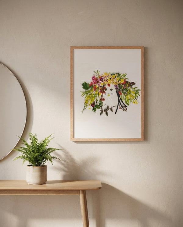 Garden Halo Lady in a red oak frame in a warm entryway with a round mirror