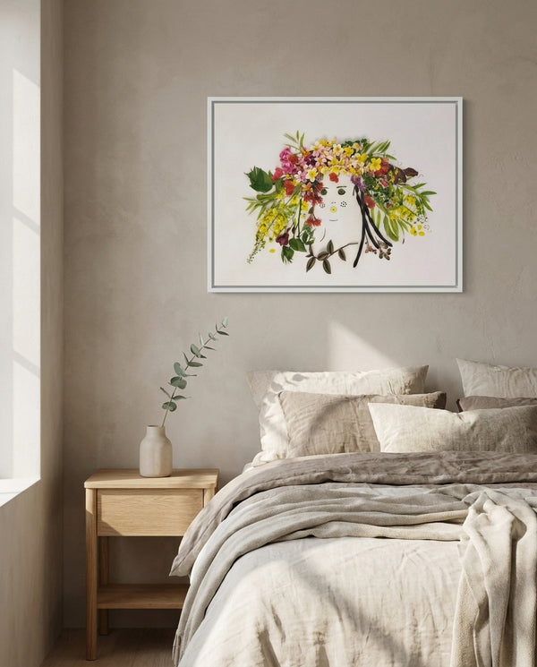 Garden Halo Lady in a white frame styled above a bed in a serene bedroom