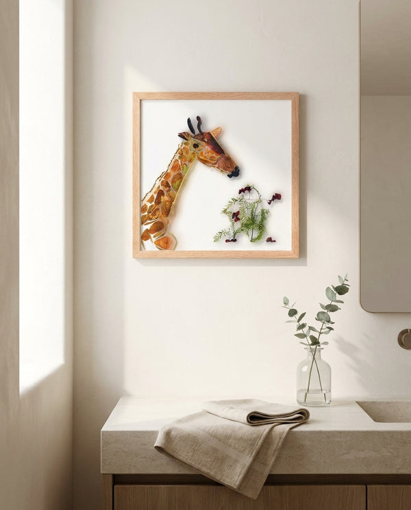 Gentle Giraffe in a red oak frame in a calm bathroom with a stone vanity
