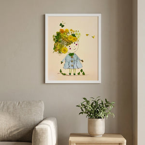Girl in Bloom whimsical floral girl wall art print in a white frame hanging in a living room