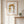 Golden Dates Portrait art in a red oak frame hanging in an entryway