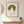 Green Meadow Lady in a red oak frame in a warm entryway with a round mirror
