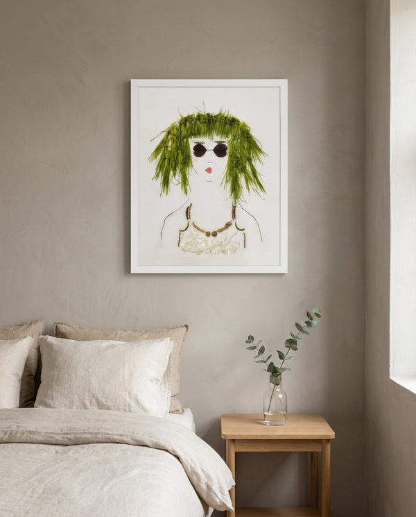 Green Meadow Lady in a white frame above a bed in a restful bedroom