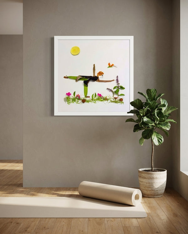 Grounded in Light art in a white frame hung in a serene yoga studio