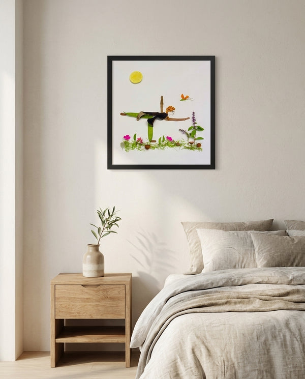 Grounded in Light art in a black frame hung in a bedroom