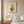 Happy Little Vase whimsical floral still life wall art print in a red oak wood frame hanging in a bedroom