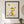 Hello Butterfly whimsical garden child wall art print in a black frame hanging in an entryway