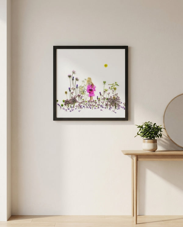 Lavender Little One storybook floral meadow wall art print in a black frame hanging in an entryway