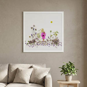 Lavender Little One storybook floral meadow wall art print in a white frame hanging in a living room