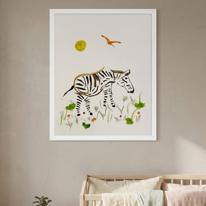Little Grazing Zebra botanical animal wall art print in a white frame hanging in a nursery