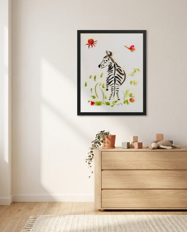 Looking Back Zebra botanical wildlife wall art print in a black frame hanging in a kids room