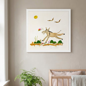 Meadow Donkey art in a white frame styled in a nursery