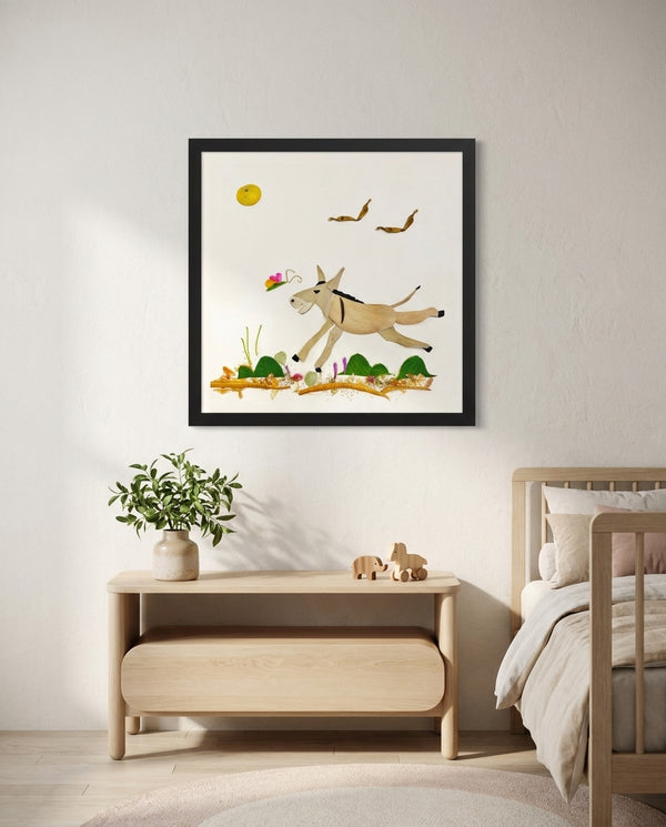 Meadow Donkey art in a black frame styled in a kids room
