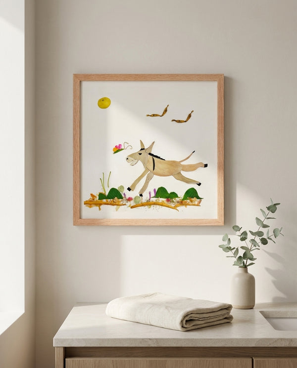 Meadow Donkey art in a red oak frame styled in a bathroom